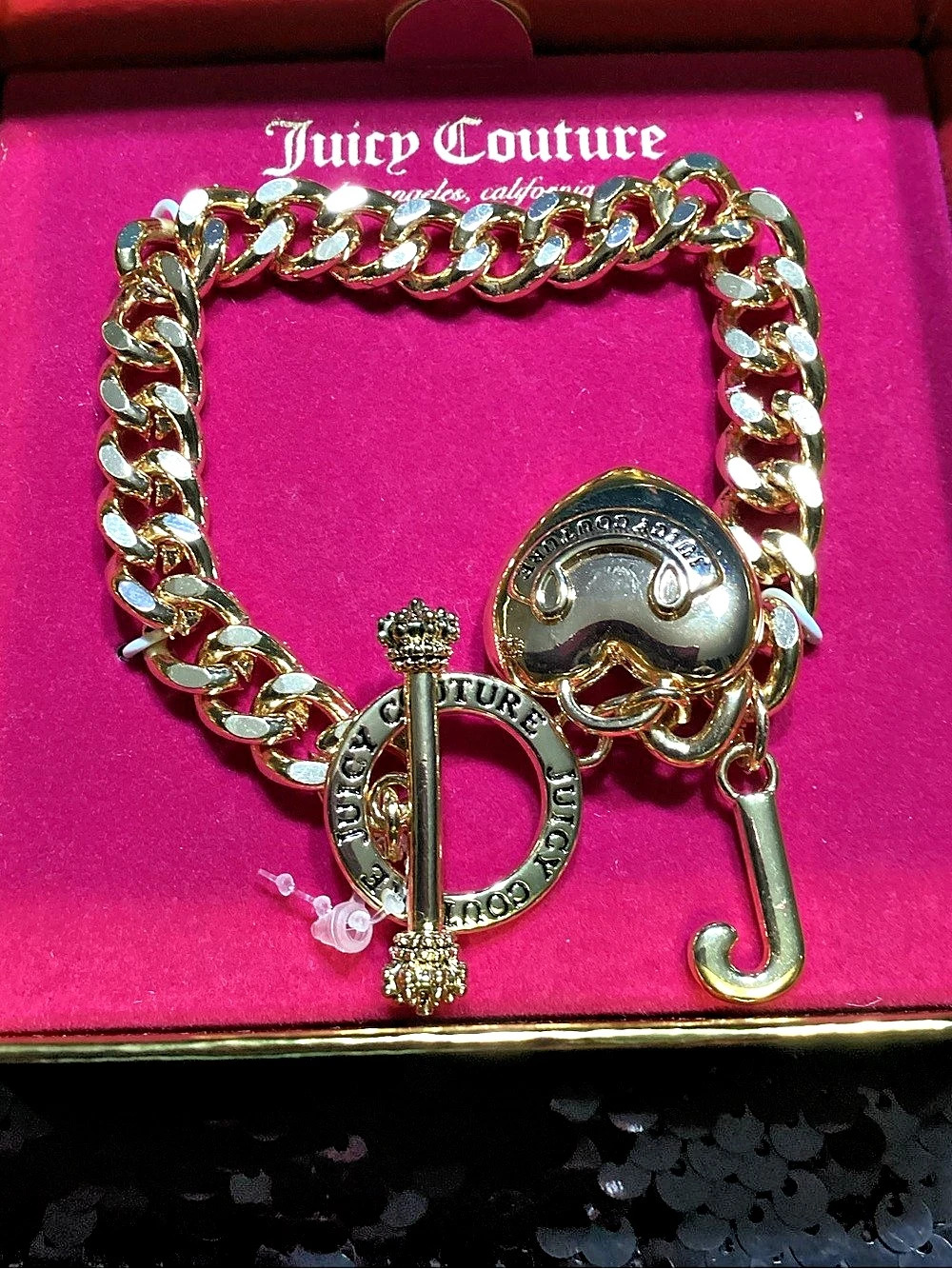 Juicy Couture Chain Pendant Locket Bracelet in Gold.
